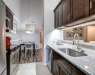 5981 Arapaho Road - Photo Thumbnail 5