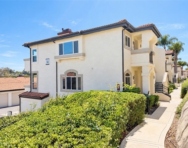 30902 Clubhouse Drive - Photo Thumbnail 1