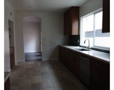 8437 W 4th Street - Photo Thumbnail 2
