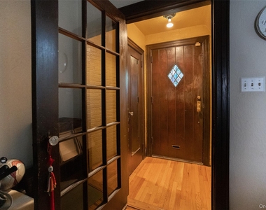 94-14 68th Avenue - Photo Thumbnail 1