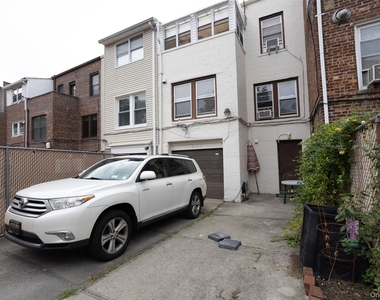 94-14 68th Avenue - Photo Thumbnail 14