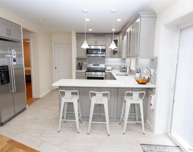 335 E Olive Street - Photo Thumbnail 4