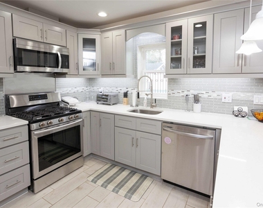335 E Olive Street - Photo Thumbnail 5
