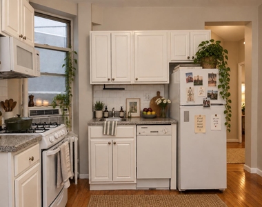 208 E 7th Street - Photo Thumbnail 1