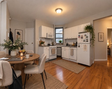 208 E 7th Street - Photo Thumbnail 3