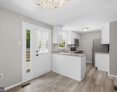 7807 Breezy Down Terrace - Photo Thumbnail 7