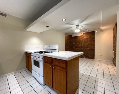 4114 N Clarendon Avenue - Photo Thumbnail 4