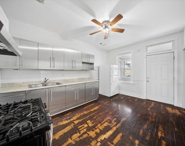 4508 S Mozart Street - Photo Thumbnail 7