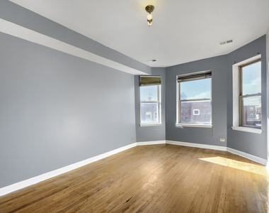 7724 S Cornell Avenue - Photo Thumbnail 2