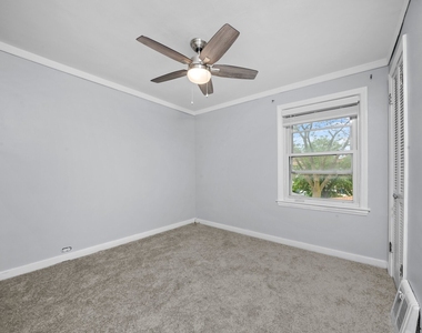 6404 S Lockwood Avenue - Photo Thumbnail 4