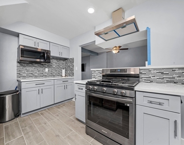 6404 S Lockwood Avenue - Photo Thumbnail 2