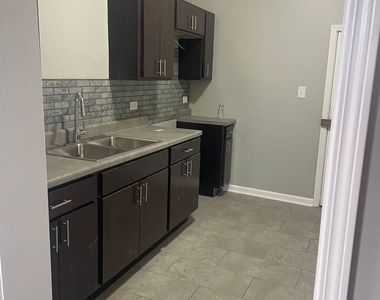 7652 S Dante Avenue - Photo Thumbnail 1