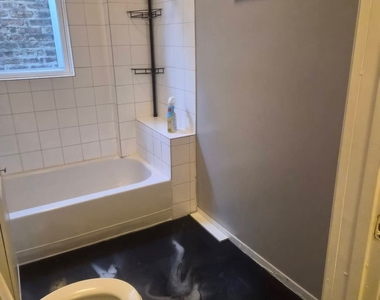 6315 S Eberhart Avenue - Photo Thumbnail 3