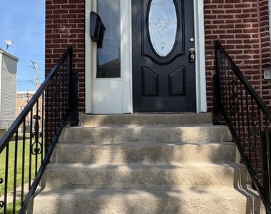 8211 S Escanaba Avenue - Photo Thumbnail 1