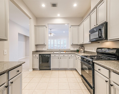 9718 Catalina Leaf Lane - Photo Thumbnail 4