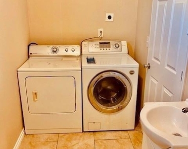 7409 Avenue L - Photo Thumbnail 4