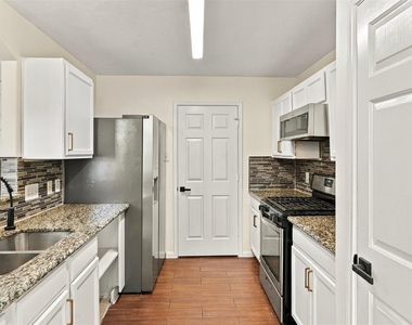 7842 Winding Creek View - Photo Thumbnail 11