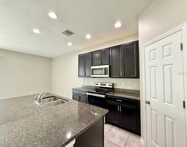 7123 Summer Holly Place - Photo Thumbnail 3