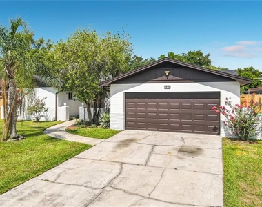 8676 Hillside Drive - Photo Thumbnail 1