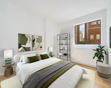 312 East 30th Street - Photo Thumbnail 2