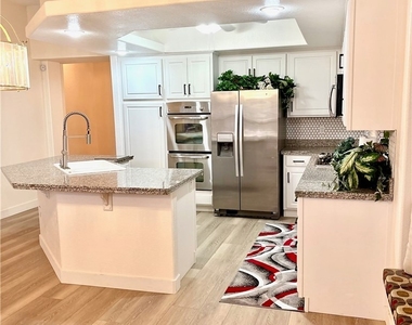 9040 Dove River Road - Photo Thumbnail 4