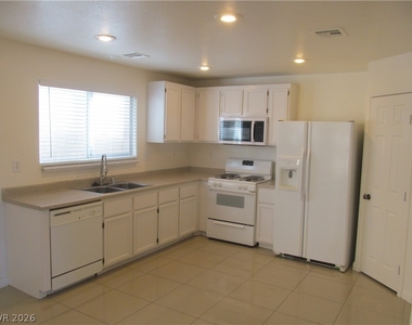 8819 Peace Treaty Avenue - Photo Thumbnail 3