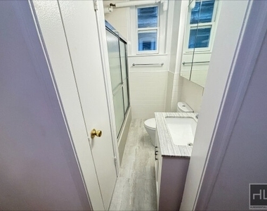 E 66 Street - Photo Thumbnail 2