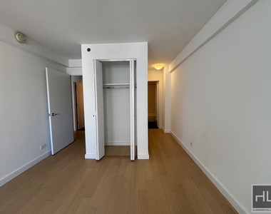 E 39th St - Photo Thumbnail 5