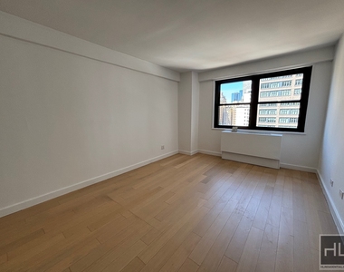 E 39th St - Photo Thumbnail 4