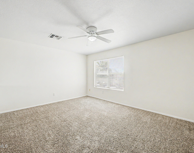15554 W Gelding Drive - Photo Thumbnail 18