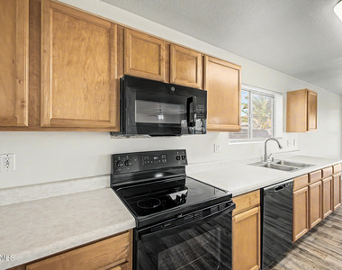 15554 W Gelding Drive - Photo Thumbnail 16
