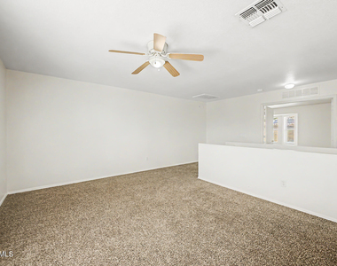 15554 W Gelding Drive - Photo Thumbnail 19
