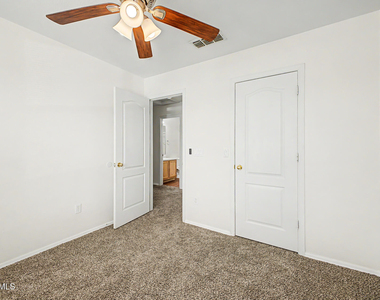 15554 W Gelding Drive - Photo Thumbnail 29