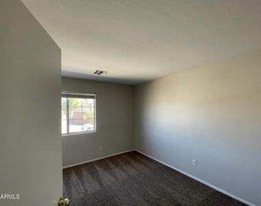 10925 W Kaler Drive - Photo Thumbnail 19