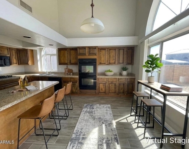 10925 W Kaler Drive - Photo Thumbnail 2