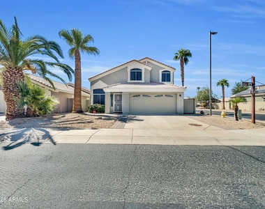 14576 N 90th Drive - Photo Thumbnail 1