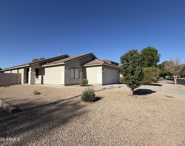 13925 W Mauna Loa Lane - Photo Thumbnail 1