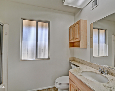 10933 W Tropicana Circle - Photo Thumbnail 24