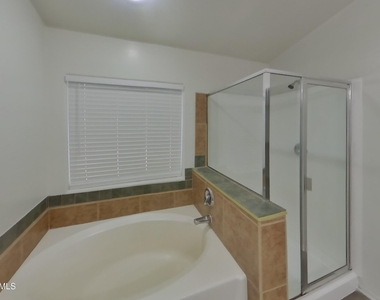 8529 W Hughes Drive - Photo Thumbnail 8