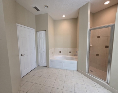 4409 Coquina Winds Way - Photo Thumbnail 37