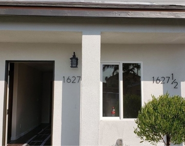 1627 E 88th - Photo Thumbnail 2