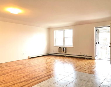 82-03 54th Avenue - Photo Thumbnail 2