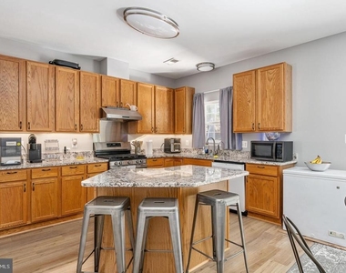 9626 Eaton Woods Place - Photo Thumbnail 2