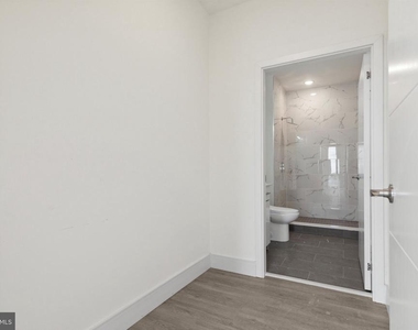1221 E Fletcher Street - Photo Thumbnail 3