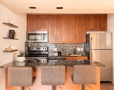 7685 Northcross Dr - Photo Thumbnail 2