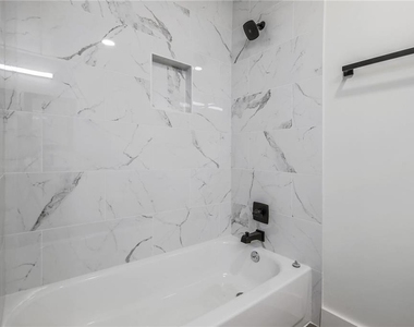 511 E 50th St - Photo Thumbnail 15