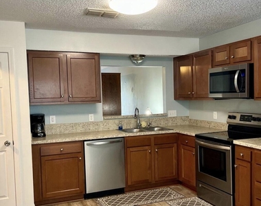 12619 Ashmore Green Drive N - Photo Thumbnail 1