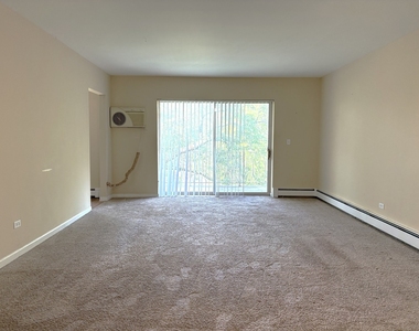 1311 S Finley Road - Photo Thumbnail 3