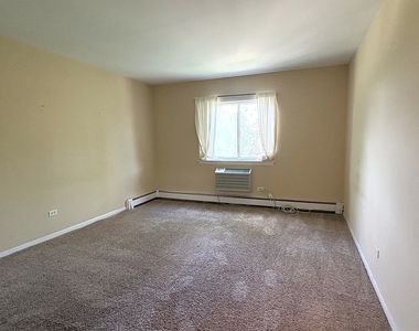 1311 S Finley Road - Photo Thumbnail 6