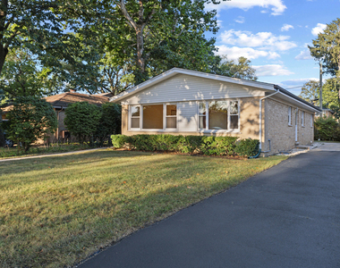 9752 Tripp Avenue - Photo Thumbnail 1